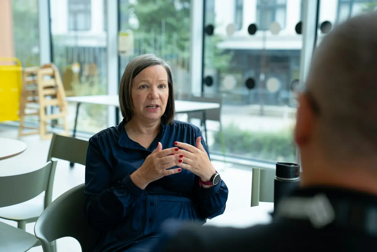 A manager in a one-to-one coaching conversation